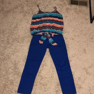 Size M sleeveless multicolored button down blouse